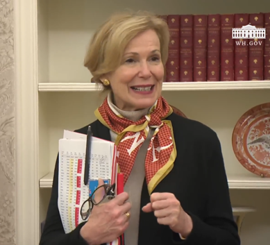 Dr. Deborah Birx with a printout of Worldometer's data table